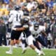 Avonte Maddox (14) causes Jackson Tyler (14) to fumble September 30, 2017 -- David Hague