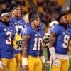 Damar Hamlin (3) Quadree Henderson (10) Jordan Whitehead (9) stand during the national anthem before taking on North Carolina at Heinz Field on November 9, 2017 in Pittsburgh, Pennsylvania. -- DAVID HAGUE