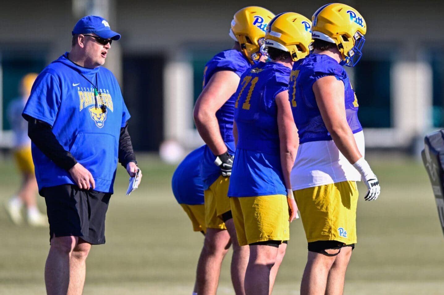 Pitt offensive line coach Jeremy Darveau coaching up his unit during spring practice. March 11, 2025 / Ed Thompson. PSN.