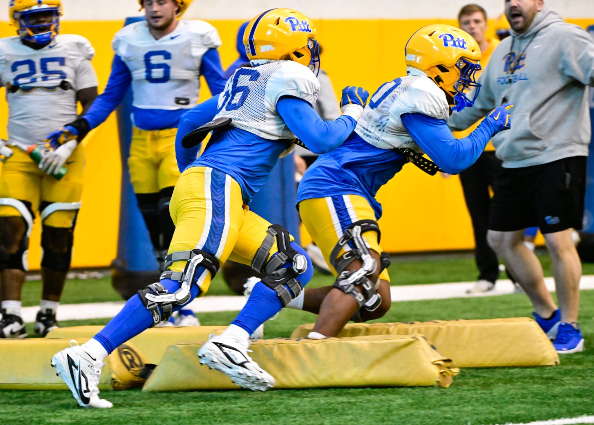 Pitt defensive ends Jaeden Moore (56) and Blaine Spires (10) with a rep during spring practice on April 8, 2025. PSN.