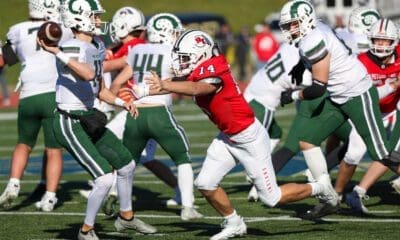 Peters Township defensive end Reston Lehman rushes the passer in the 5A WPIAL Championship game.
