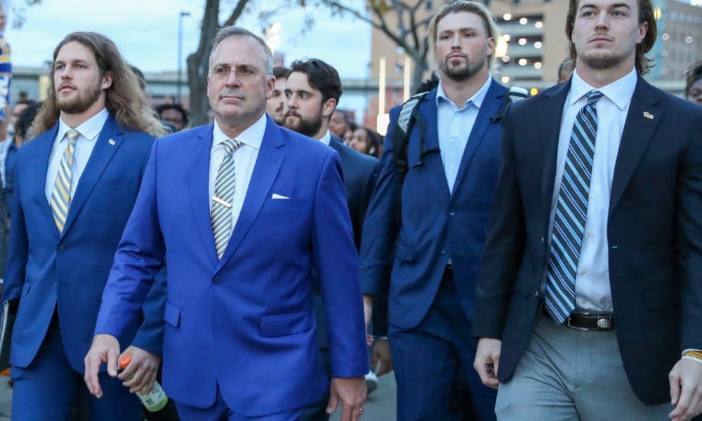 Former Pitt quarterback Kenny Pickett and Pat Narduzzi.