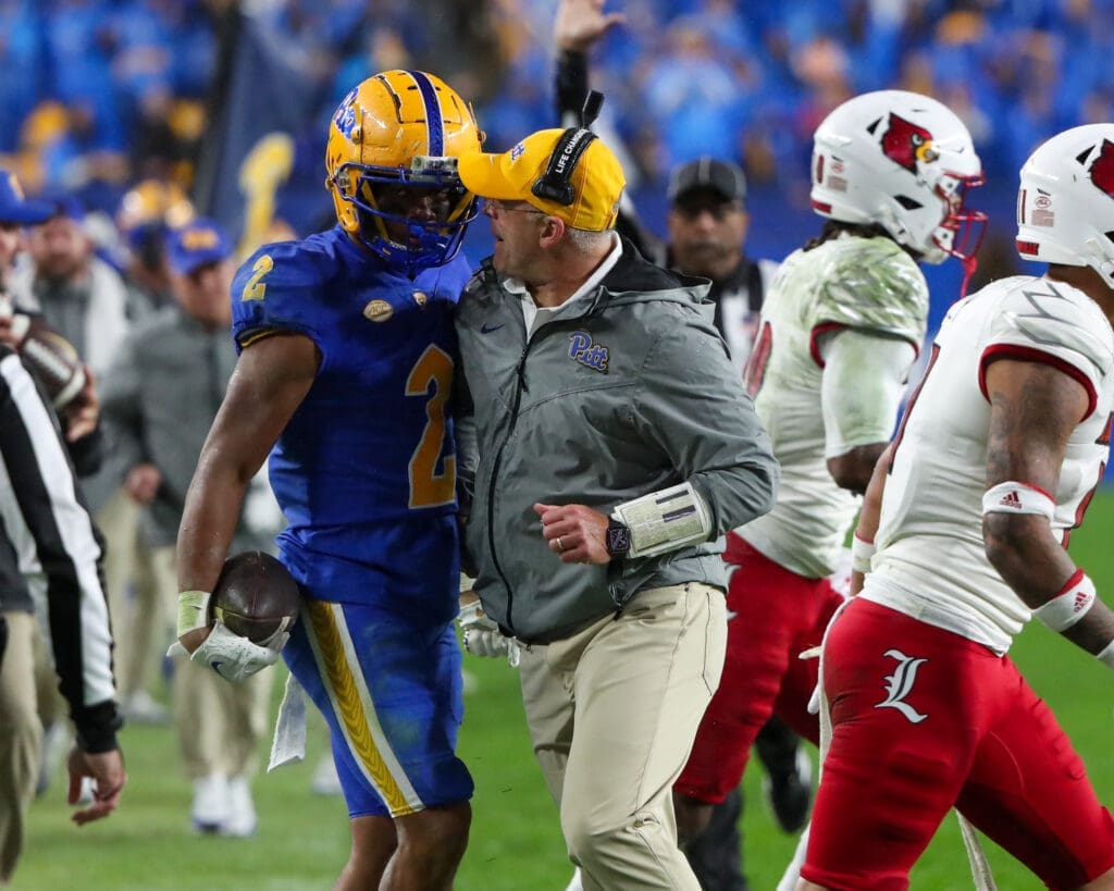 Pitt head coach Pat Narduzzi and wide receiver Kenny Johnson.