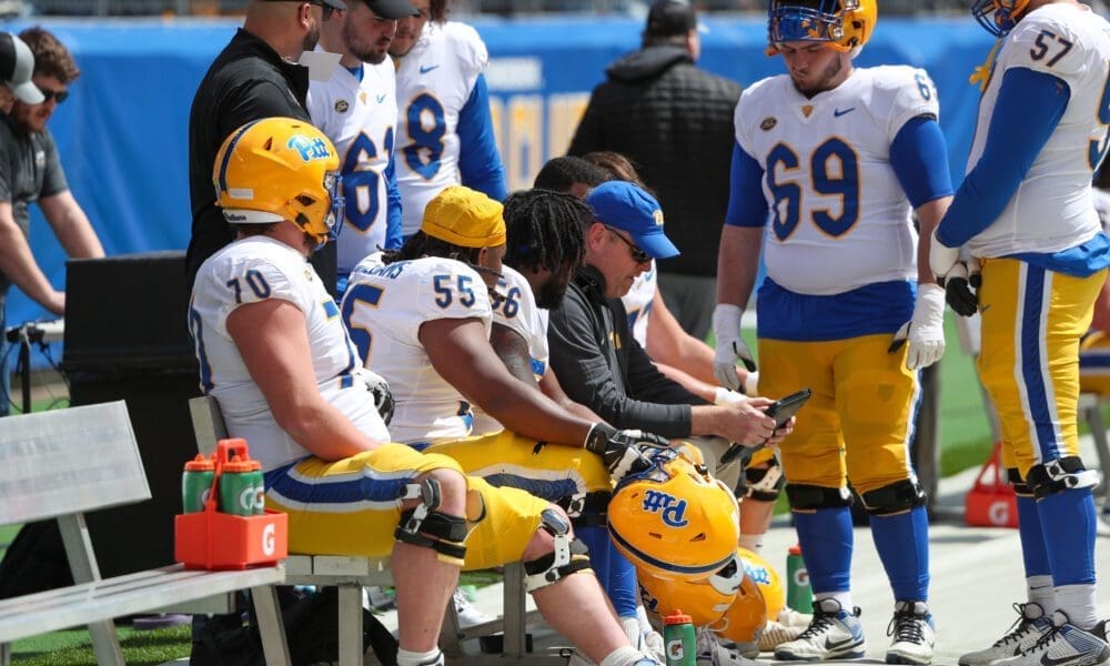 Pitt football's offensive line with coach Jeremy Darveau. April 13, 2024 // David Hague. PSN.