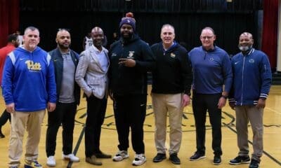 Imani Christian Head Coach LaRoi Johnson, along with Pitt head coach Pat Narduzzi, defensive line coach Charlie Partridge and safeties coach Cory Sanders and Penn State associate head coach, defensive recruiting coordinator and cornerbacks coach Terry M. Smith, plus defensive coordinator/linebackers coach Tom Allen all took a picture together with Johnson and Imani head of school Paulo Nzambi.