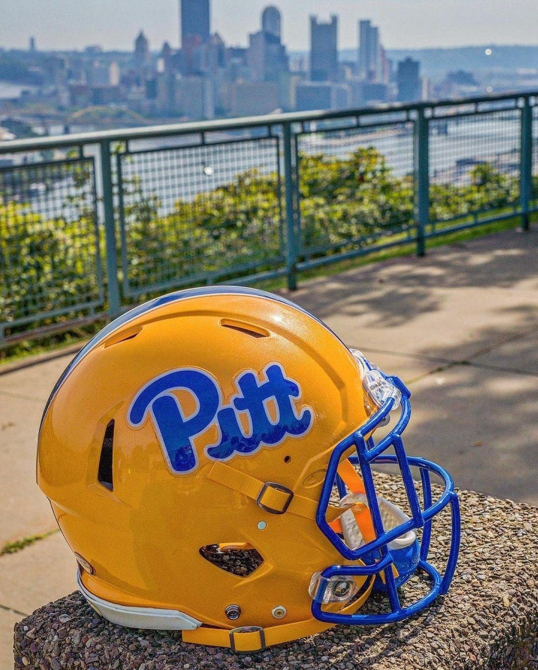 Pitt Football Helmet overlooking Pittsburgh