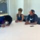 Washington Wizards guard Carlton "Bub" Carrington signs first NBA contract alongside family. Photo via Carrington family.