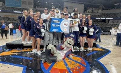 Robert Morris players and cheerleaders celebrate after winning the Horizon League Championship on March 11, 2025