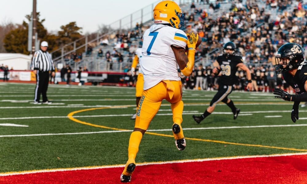Westinghouse receiver Taymir O'Neal scores a game-tying two-point conversion in the second quarter of the PIAA 2A State Championship Game. Photo by Eddie Provident.