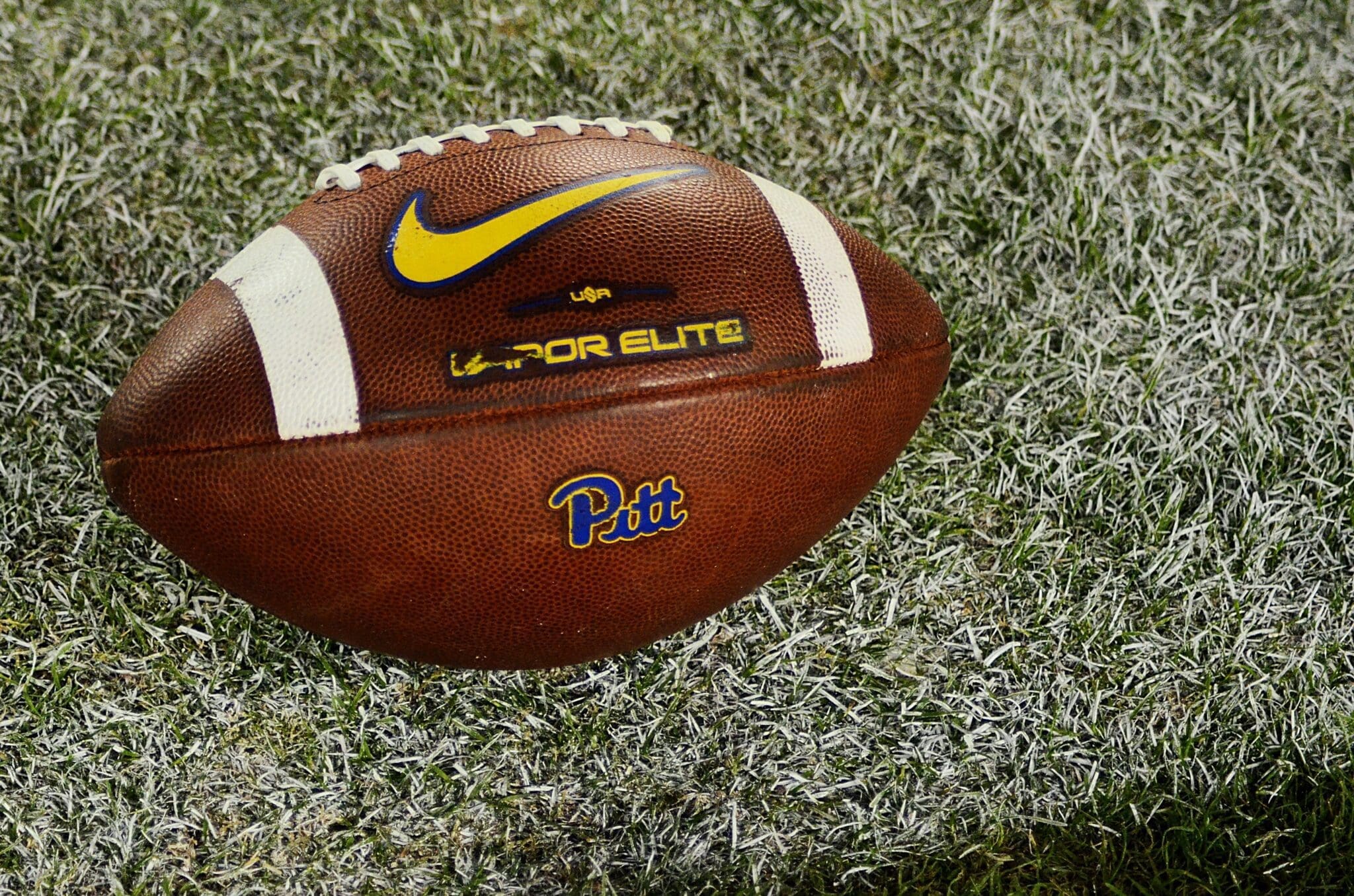 A Pitt football lays on the turf on Saturday, Sept. 30, 2023 in Blacksburg, Virginia. (Mitchell Northam / Pittsburgh Sports Now.) College Football / Signing Period. NCAA.