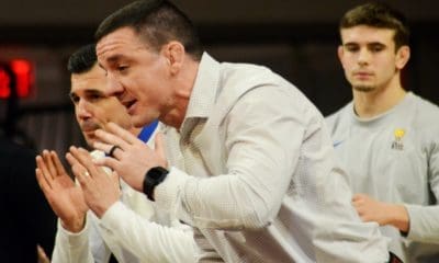 Pitt wrestling coach Keith Gavin calls out to his team on Friday, Feb. 10, 2023 in Raleigh, N.C. (Mitchell Northam / Pittsburgh Sports Now)