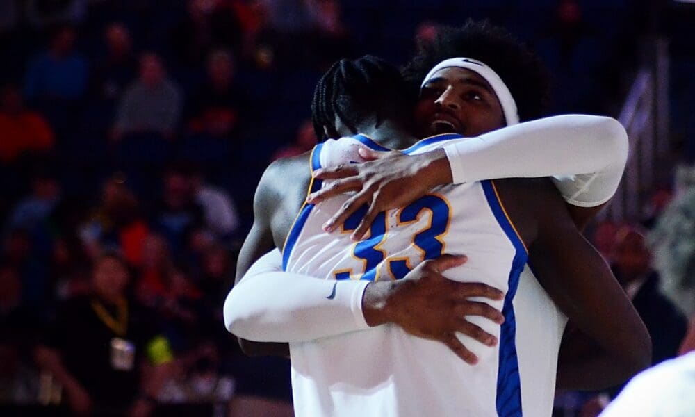 Federiko Federiko and Blake Hinson before Pitt's ACC Tournament game vs. Georgia Tech in Greensboro, N.C. on March 8, 2023. (Mitchell Northam / Pittsburgh Sports Now)