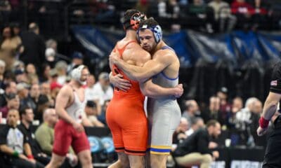 Brothers Mac Stout (Pitt) and Luke Stout (Princeton) at the NCAA wrestling championships. Photo courtesy of Pitt Athletics.