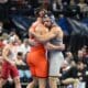 Brothers Mac Stout (Pitt) and Luke Stout (Princeton) at the NCAA wrestling championships. Photo courtesy of Pitt Athletics.